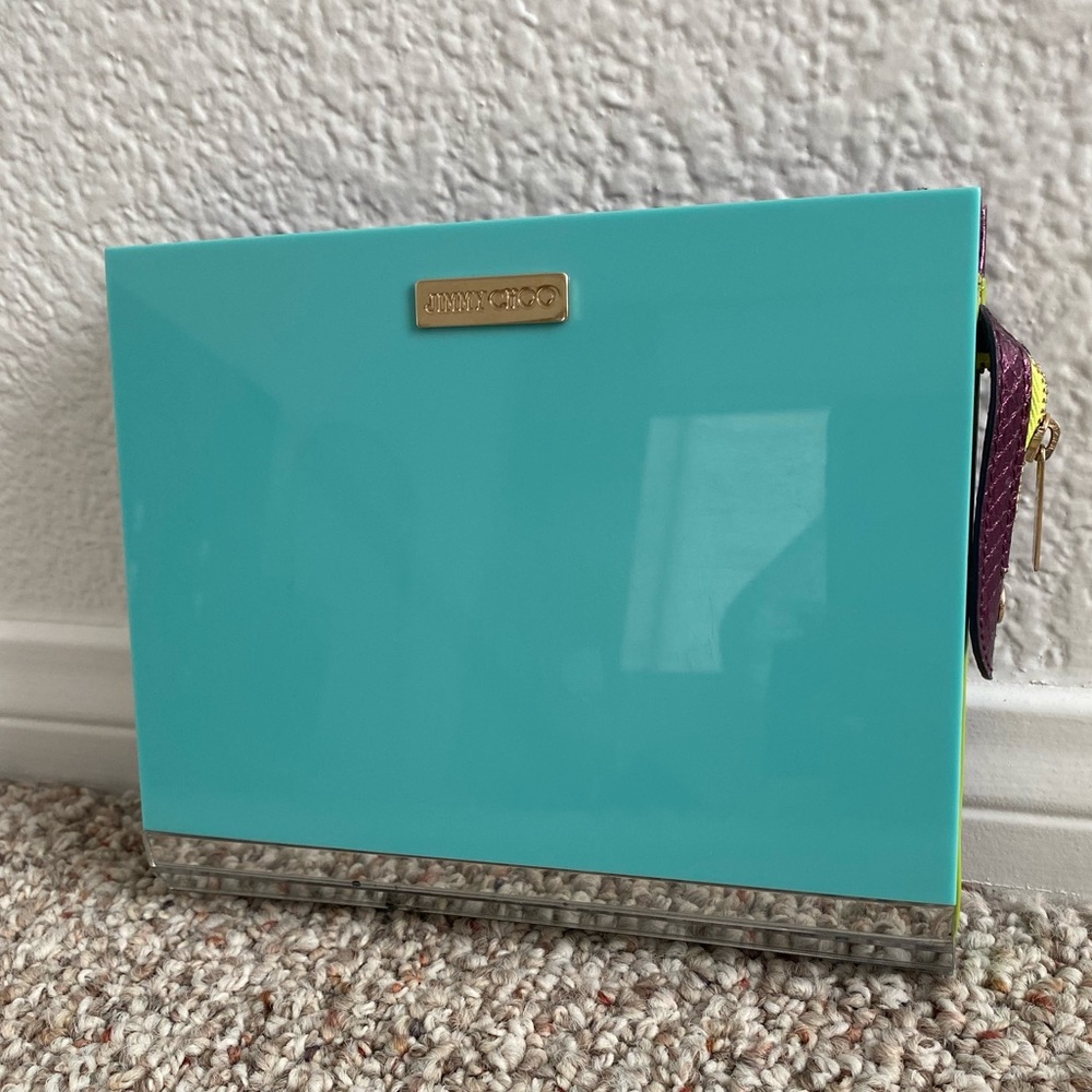 Jimmy Choo Acrylic Clutch with over the shoulder chain.